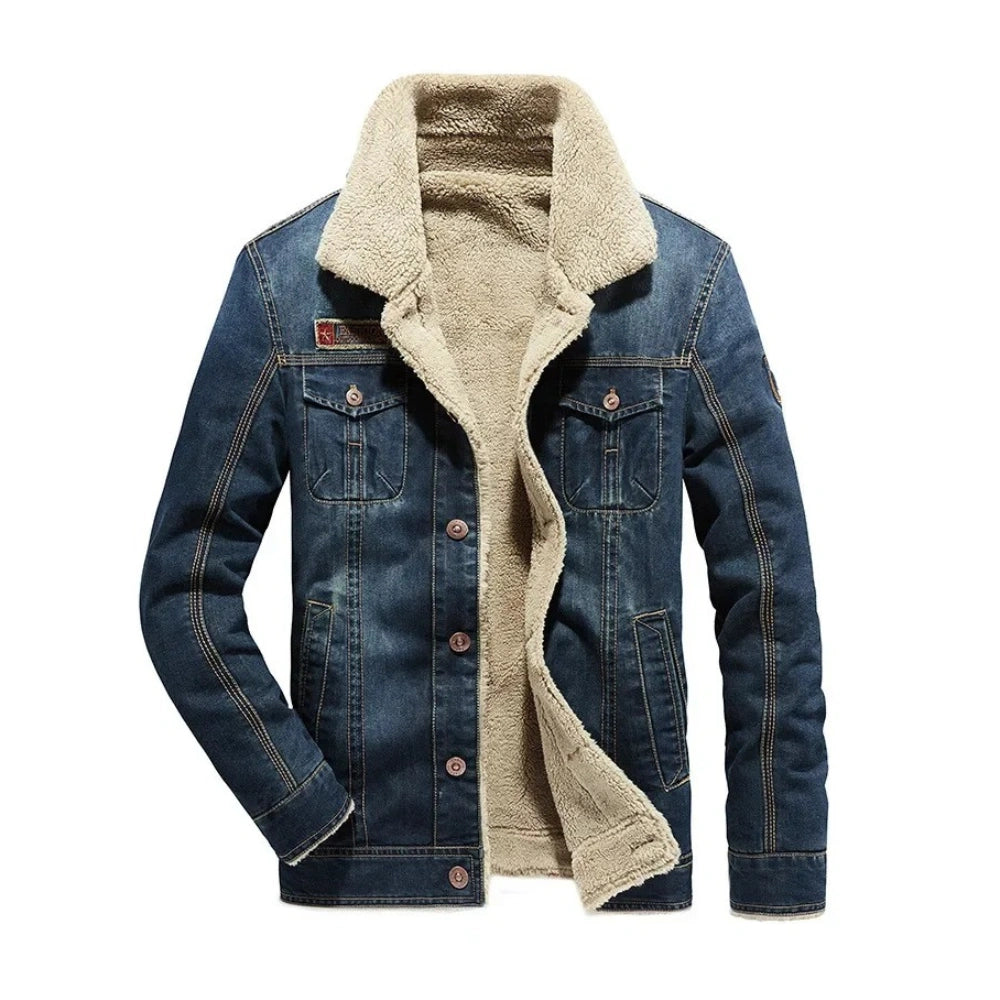 A men's blue denim jacket with a thick beige sherpa fleece lining, shown open against a plain white background.